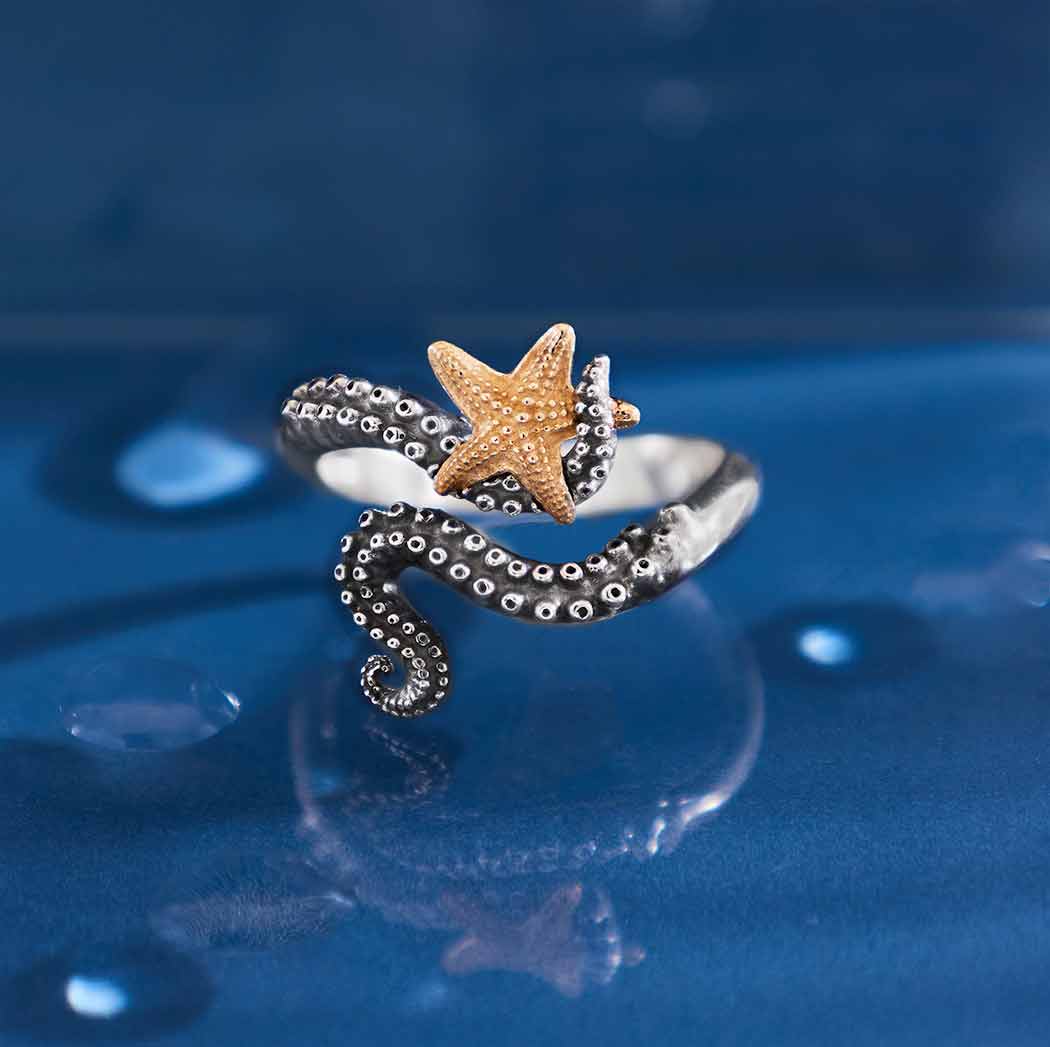 silver ring with starfish and octopus tentacles