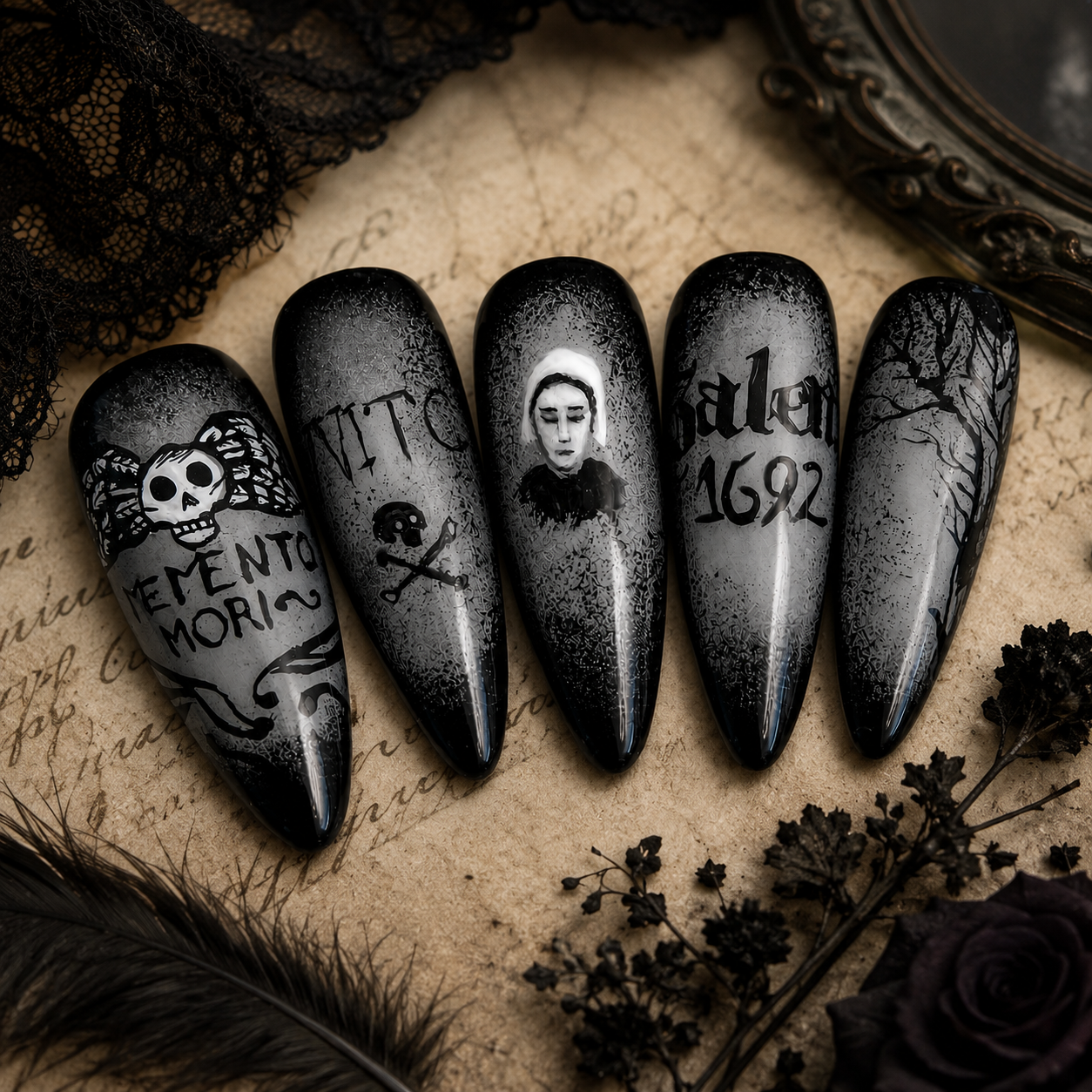 Hand-painted black and gray Gothic press-on nail set inspired by the Salem Witch Trials, featuring a Puritan portrait, Memento Mori artwork, Salem 1692 lettering, and a barren tree.